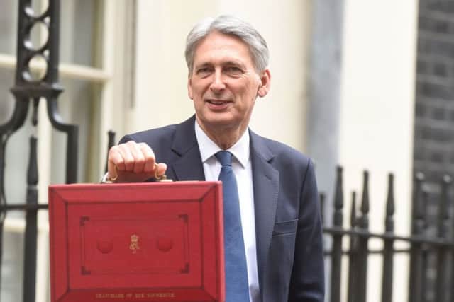 Chancellor Philip Hammond controls the nation's purse-strings.