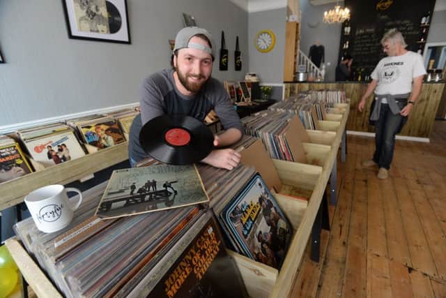 Dom White, co-owner of FortyFive, with the vinyl racks in the new cafe in Micklgate, York.
 Picture by Bruce Rollinson