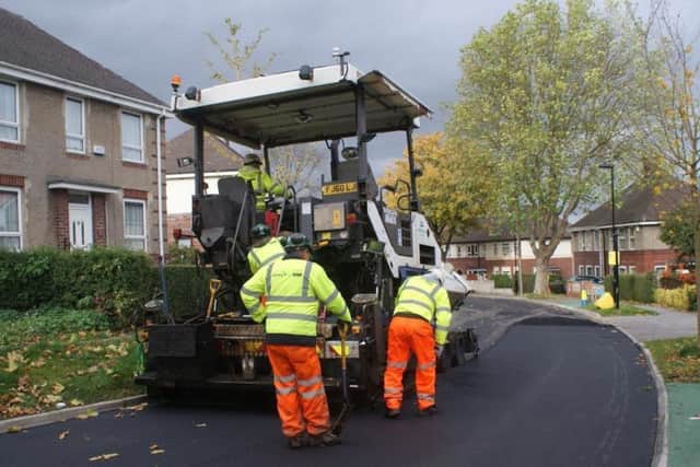 The contract with Amey also involves work on resurfacing pavements and roads.