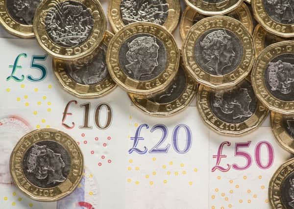 Wages are worth a third less in some parts of the country than a decade ago, according to a report by the TUC. Picture: Dominic Lipinski/PA Wire.