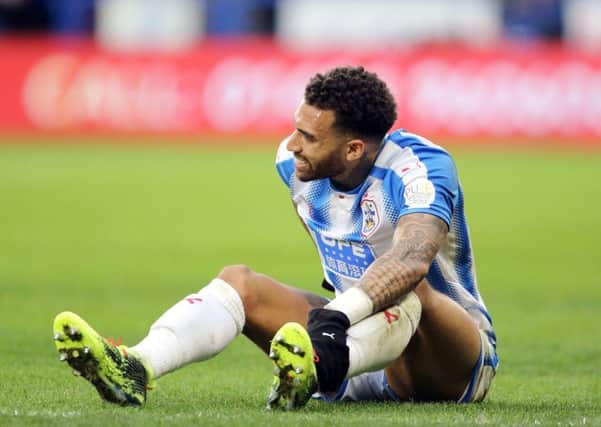 Huddersfield Town's Danny Williams lies injured (Picture: PA)