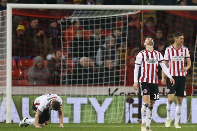 Sheffield United players look dejected after conceding to West Bromwich Albion at Bramall Lane (Picture: James Wilson/Sportimage).