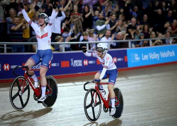 Katie Archibald (left) and Laura Kenny of Great Britain celebrate after winning the Women's Madison Final.