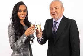 The winner of the latest series of the BBC programme The Apprentice, Sian Gabbidon from Leeds, celebrates with Lord Sugar in London. PIC: Victoria Jones/PA Wire