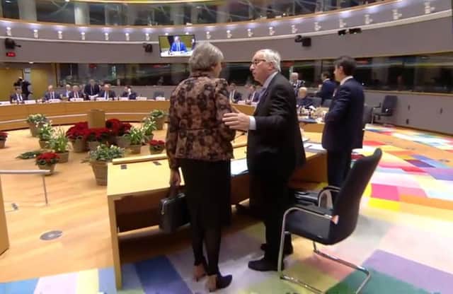 Theresa May and Jean-Claude Juncker at last week's EU summit.