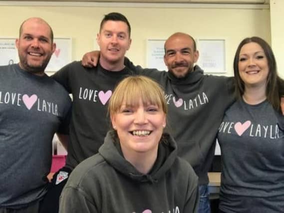 Stacey Dennis, front, with the Love Layla team