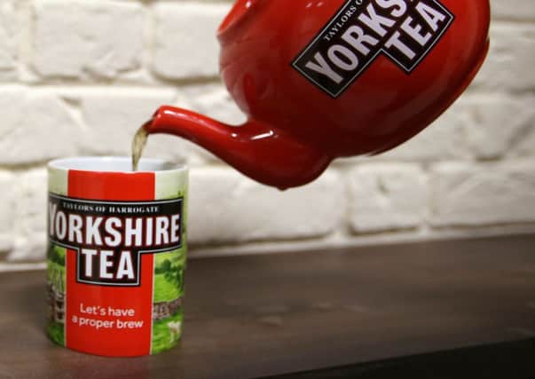 Yorkshire Tea being poured from a teapot.