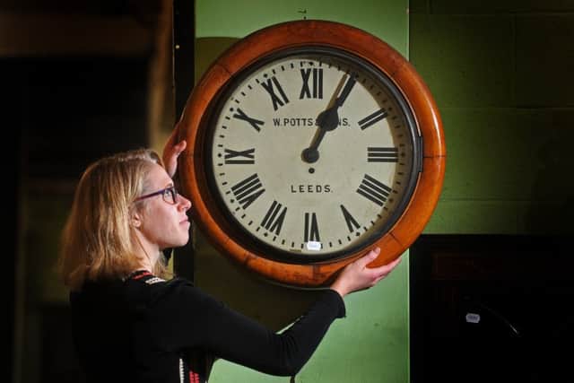 Aurora Elizabeth Durham at Tennants Auctioneers in Leyburn with a Potts of Leeds station clock from Helperby Manor.  Picture: Tony Johnson.
