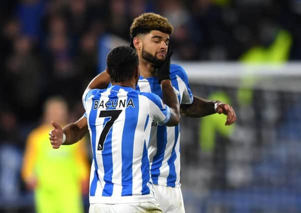 On target: Huddersfield's Philip Billing celebrates with Juninho Bacuna after scoring against Southampton. Picture: Getty Images