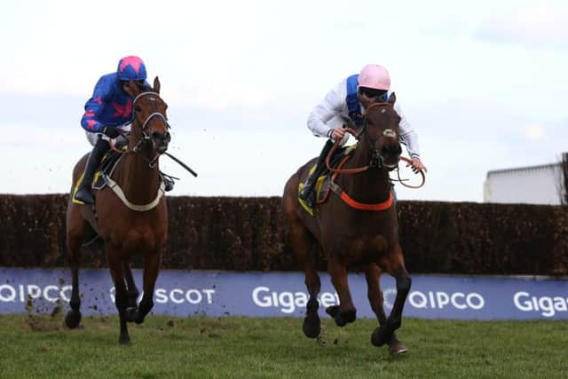 Waiting Patiently and Brian Hughes (right) got the better of the Paddy Brennan-ridden Cue Card in the Ascot Chase.