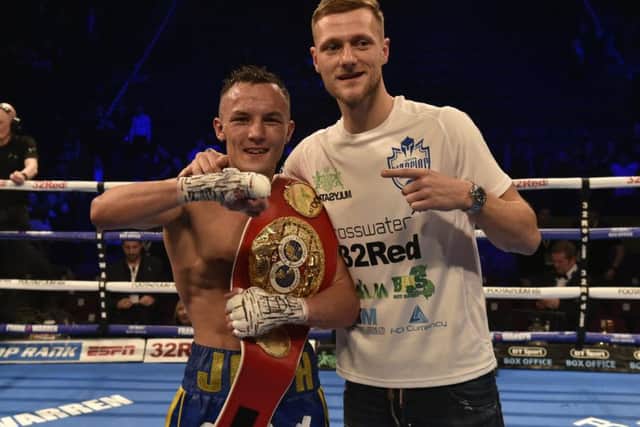 THAT'S OUR BOY! Leeds United captain Liam Cooper celebrates with 'local hero' and Whites fan Josh Warrington. Picture: Steve Riding.