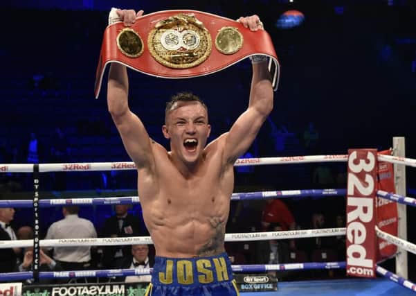 STLL KING OF THE WORLD: 
Josh Warrington celebrates his win over Carl Frampton on Saturday in Manchester. Picture: Steve Riding.