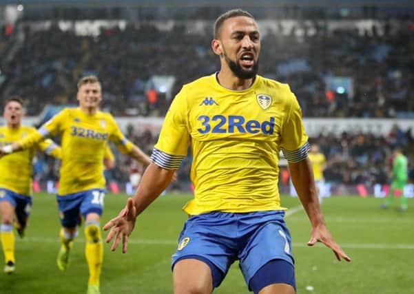 Leeds United's Kemar Roofe celebrates scoring his side's third goal of the game during the Sky Bet Championship match at Villa Park, Birmingham.