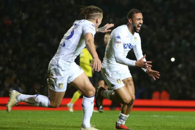 FINE TIMING: Kemar Roofe celebrates scoring Leeds United's third and winning goal. Picture: Varleys.