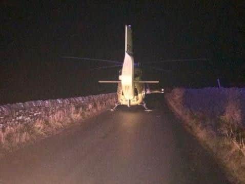 The air ambulance landed in this narrow country lane in complete darkness