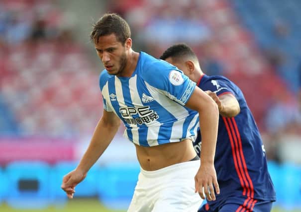 Huddersfield Town's Ramadan Sobhi (left) has left the club on a loan deal (Picture: PA)