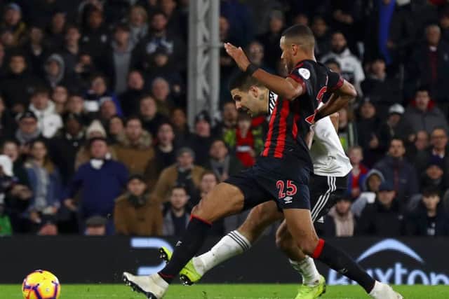 Sickener: Fulham's  Aleksandar Mitrovic scores the stoppage-time winner against Huddersfield Town. Picture: Clive Rose/Getty Images
