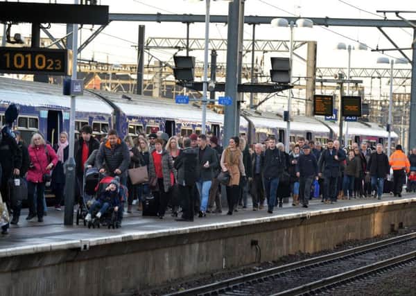 Pasengers at Leeds Station - the New Year begins with fare increases. Are they justified?