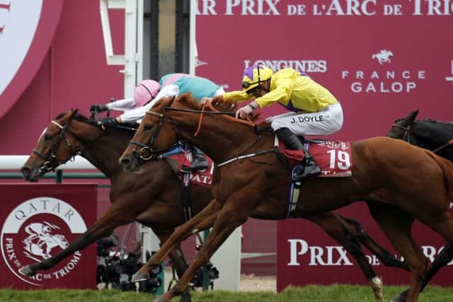 Enable and Frankie Dettori held off Sea Of Class, the mount of James Doyle, in a pulsating finish to the 2018 Prix de l'Arc de Triomphe.