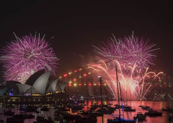 New Year fireworks exploding over Sydney Harbour.