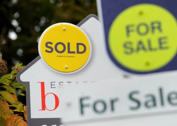 Embargoed to 0001 Wednesday January 02  File photo dated 14/10/14 of estate agents signs. The number of first-time buyers getting on the property ladder with a mortgage in the last 12 months was at its highest level since 2006, according to estimates from Yorkshire Building Society.