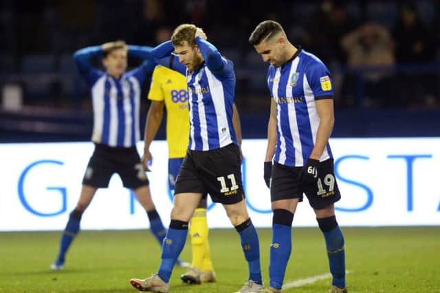 Sheffield Wednesday's Sam Winnall, left and Marco Matias shows their frustration at Hillsborough. Picture Steve Ellis