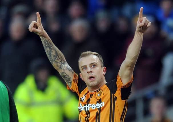 MAGIC MAN: Hull City's Kamil Grosicki celebrates one of his two goals in the 6-0 win over Bolton Wanderers. Picture: Tony Johnson