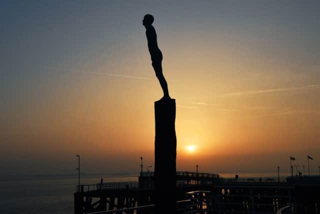 The sun sets over Hull's Voyage sculpture. Picture: Jonathan Gawthorpe.