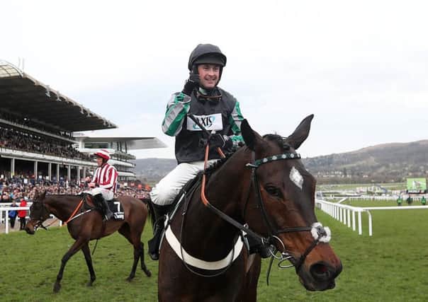 WINNERS: Altior and jockey Nico de Boinville after winning the Queen Mother Champion Chase at Cheltenham in March. Picture: David Davies/PA