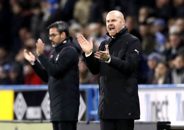Burnley manager Sean Dyche, right, and Huddersfield Town counterpart David Wagner during Wednesday's Premier League match at the John Smith's Stadium (Picture: Martin Rickett/PA Wire).