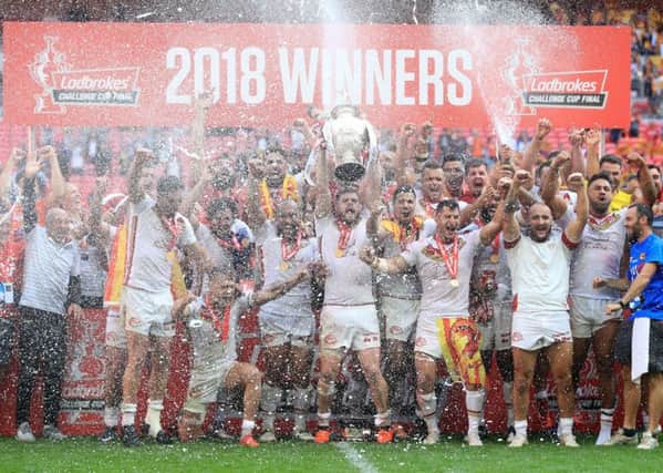 Catalan Dragons celebrate winning the Ladbrokes Challenge Cup Final at Wembley last season.
