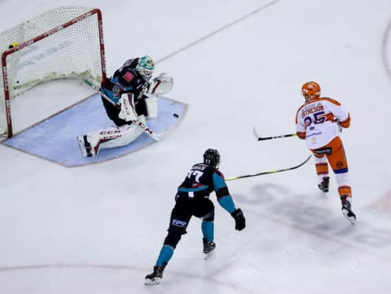 CLOSE CALL: Sheffield Steelers' defenceman Mark Matheson, far right, goes close with a back-handed effort on Sunday evening. Picture: Press Eye/EIHL.