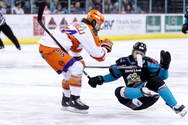 WELCOME BACK: Sheffield Steelers' Ryan Martinelli, left, endured a frustrating weekend on his return to former club Belfast Giants. Picture: Press Eye/EIHL.