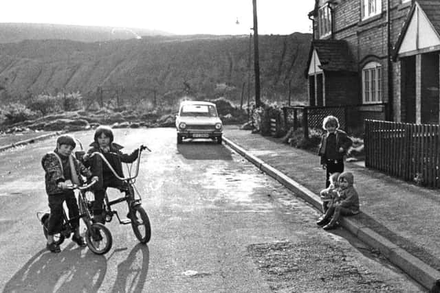 Children in front of Dinnington Colliery tip at end of Plantation Street, April 30, 1975.