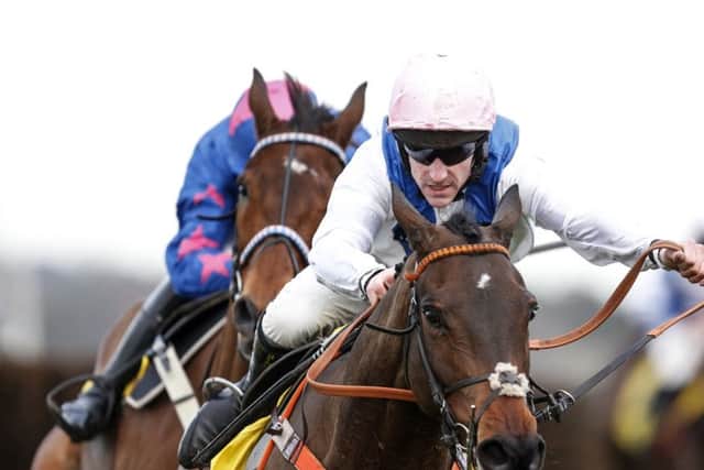 Brian Hughes and Waiting Patiently win the Grade One Ascot Chase in February last year.