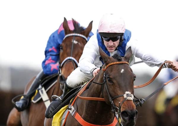 Brian Hughes and Waiting Patiently win the Grade One Ascot Chase in February last year.