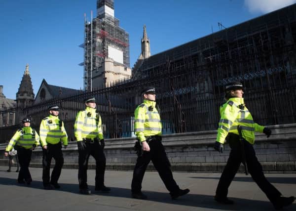 Police on patrol outside the Houses of Parliament as Brexit tensions rise.