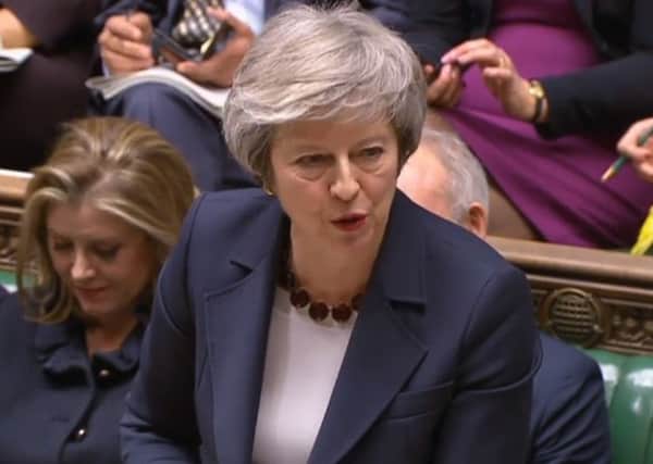 Theresa May, pictured responding to Jeremy Corbyn at Prime Minister's Questions.