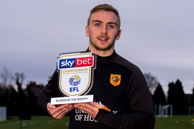 TOP MAN: Jarrod Nowen with his Championship Player of the Month award. Picture courtesy of EFL.