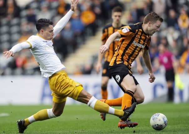 Action from last season's KCOM Stadium clash between Hull City and Sheffield Wednesday. Picture: Steve Ellis