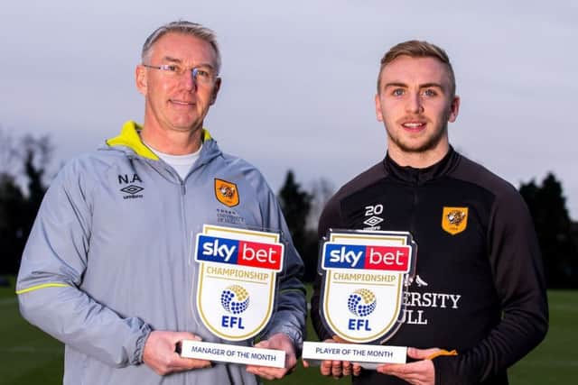 WINNERS: Hull City's Nigel Adkins and Jarrod Bowen with their 'month' trophies. Picture via EFL.