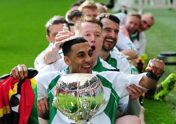 Wembley winners: 
North Ferriby United players celebrate with the FA Trophy in 2015.