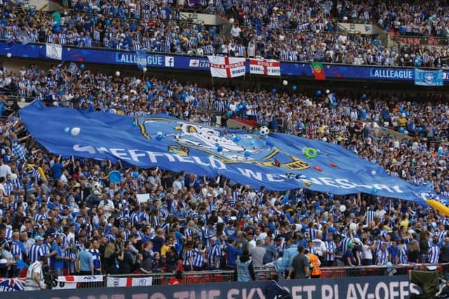 Top support: Sheffield Wednesday fans helped to produce an incredible atmosphere at Wembley in the play-off final against Hull.