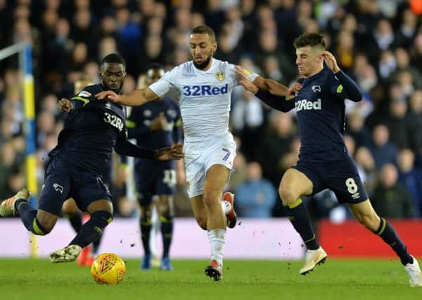 Kemar Roofe on the charge as Fikayo Tomori and Mason Mount close in.