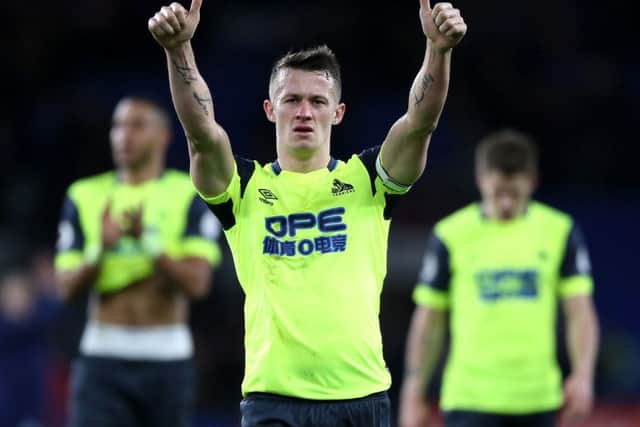 Huddersfield Town's Jonathan Hogg acknowledges fans after the final whistle during the Premier League match at the Cardiff City Stadium. (Picture: Nick Potts/PA Wire)