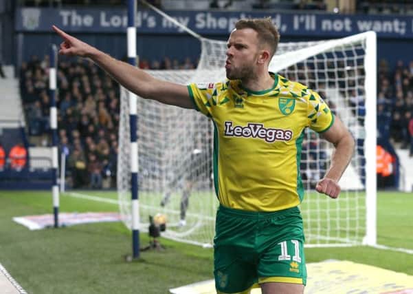 On target: Norwich City's Jordan Rhodes celebrates scoring at West Bromwich.