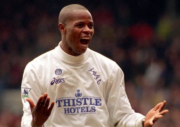 Leeds United Phil Masinga celebrates to the crowd after scoring the first goal for Leeds against Birmingham during his time with the club.