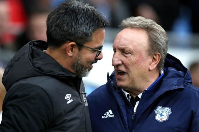 Huddersfield Town manager David Wagner (left) greets Cardiff City manager Neil Warnock (right) before the Premier League match at the Cardiff City Stadium. (Picture: Nick Potts/PA Wire)