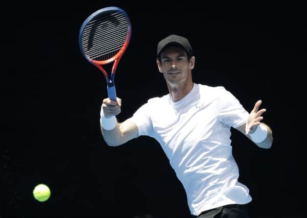 Andy Murray warms up during the weekend for his first-round match in Melbourne (Picture: Kin Cheung/AP).