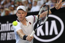 Going out: Britain's Kyle Edmund makes a backhand return to Tomas Berdych. Picture: AP Photo/Andy Brownbill